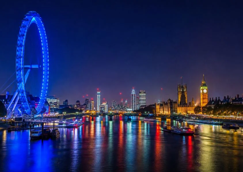London skyline and the River Thames lit up at night