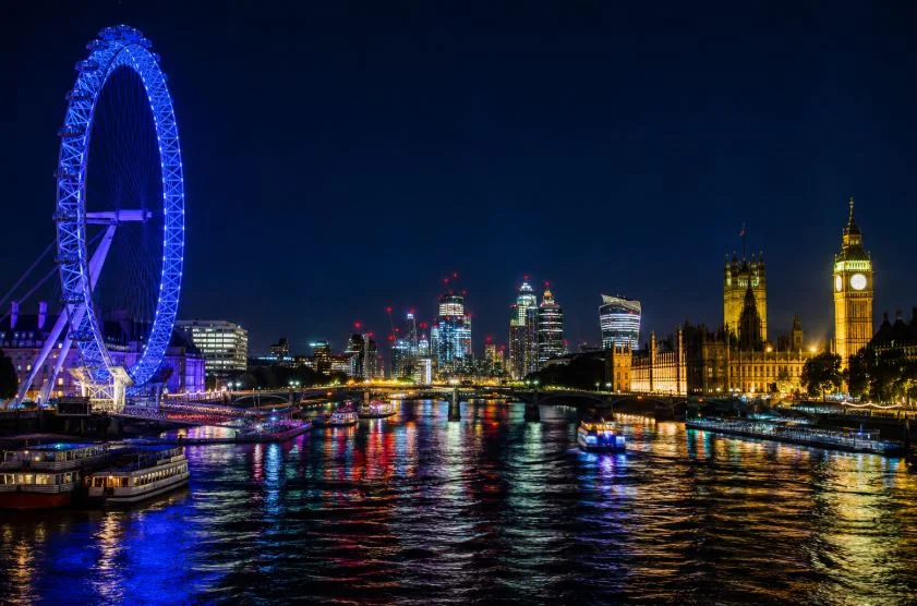 London skyline and the River Thames lit up at night