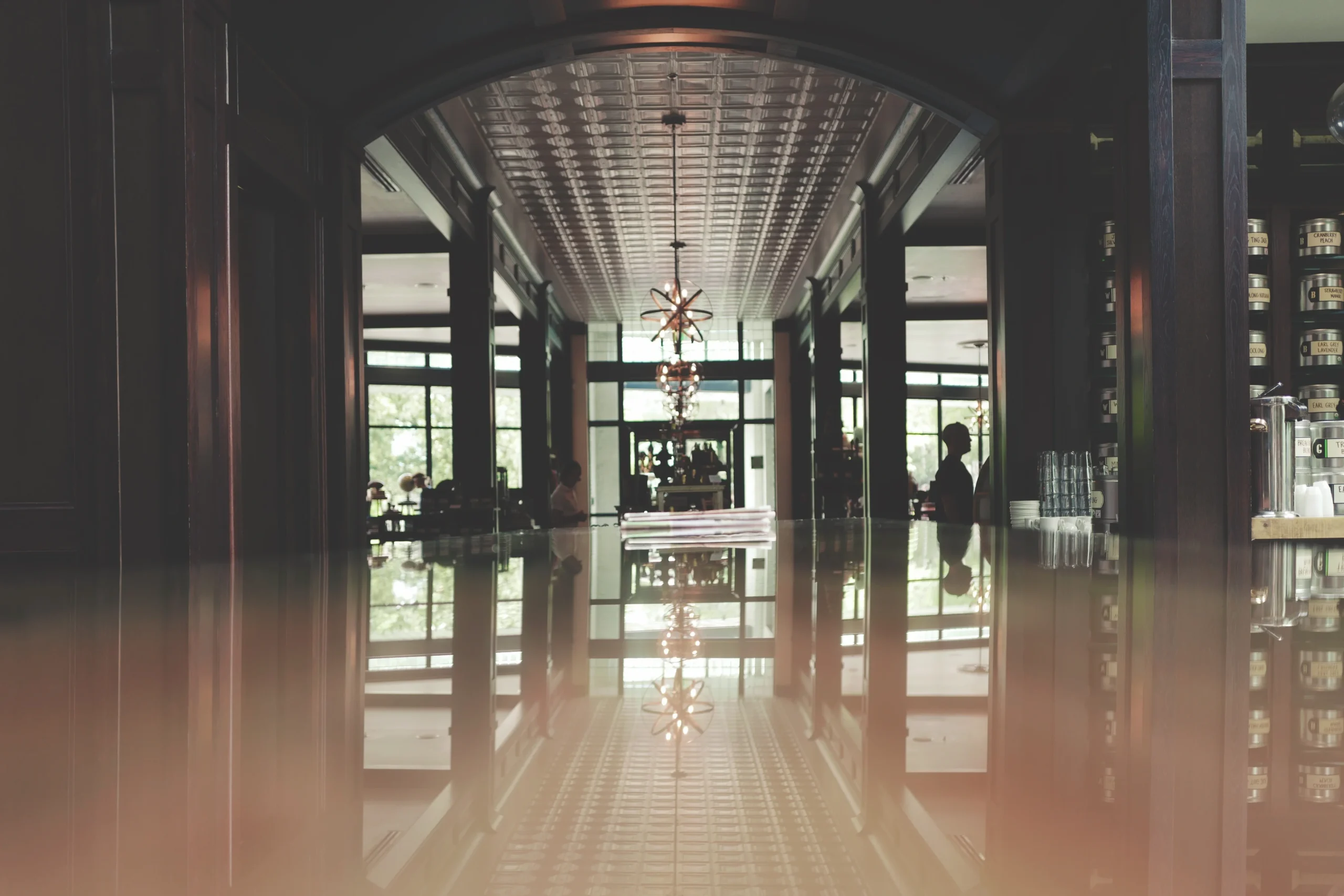 Modern hotel lobby near Gatwick Airport with reception desk
