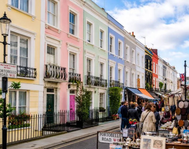 Colourful pastel houses on a street in Notting Hill, London