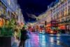 A London street decorated with Christmas lights at night